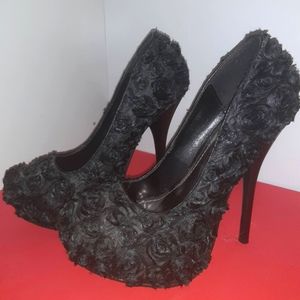 Luxe black rosette heels by Story